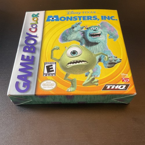 Monsters, Inc. Nintendo Game Boy Color box with green Monster, blue overalls, yellow background, and THQ logo.