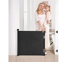 Retractable safety gate. Black w/105cm height and 460cm Lenght, New in Box
