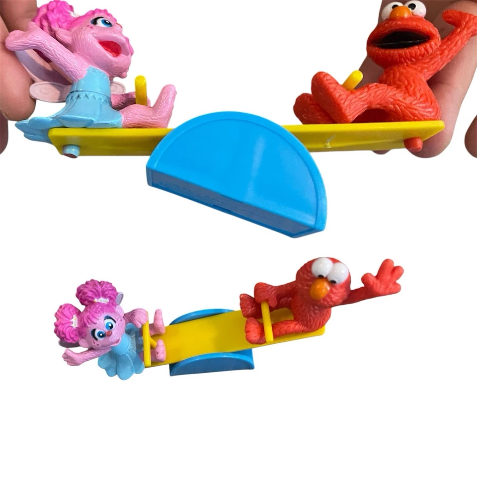 Taller de sésamo panadería artesanías Elmo Zoe Teeter Totter figura tapa de pastel Foto 2 de 2