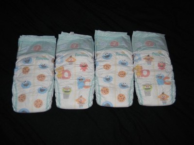 4 sample  pampers baby-dry size 7 over 26-50+Lbs.( Ultra Cushiony)