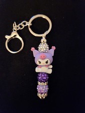 Hand designed Kuromi beaded key chain/bag charm by MoonQueen