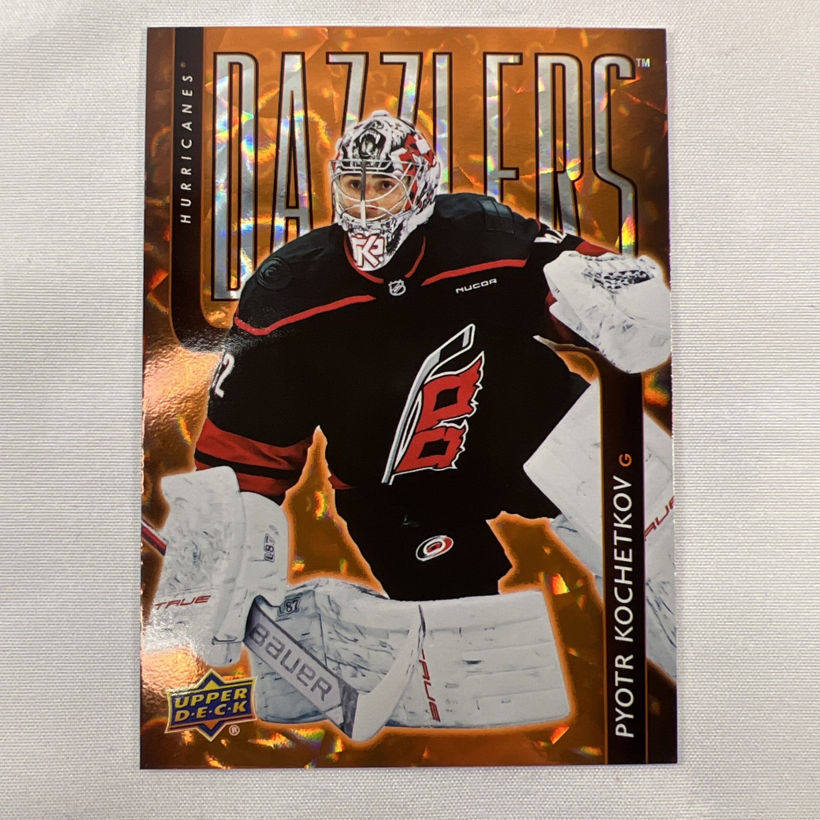 2025-26 Upper Deck Series 1  #DZ9 Pyotr Kochetkov Dazzlers Orange Carolina
