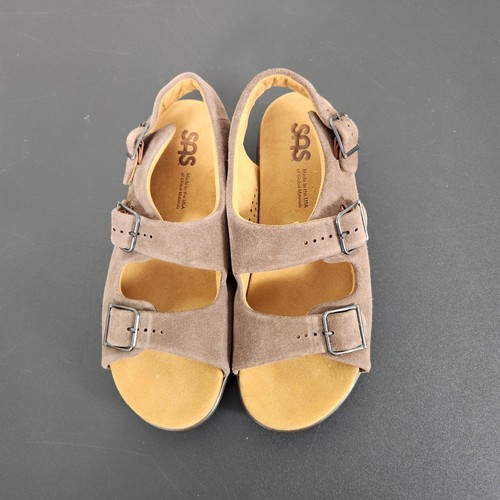 Brown suede SAS women’s slingback sandals with ankle straps, silver buckles, and tan cushioned insoles.