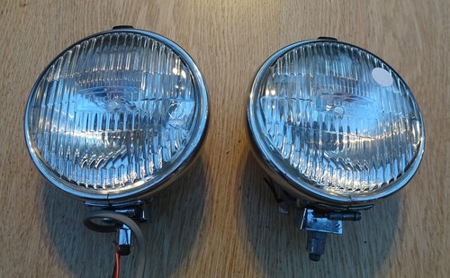 A pair of Lucas FT6 chrome fog lamps.