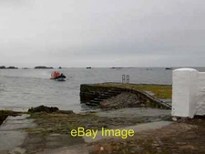 Photo 6x4 Ardbeg Pier Our RIB is just about to arrive to take 12 of us to c2012