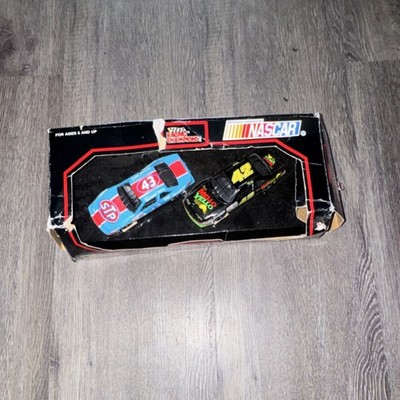 Racing Champions Racing Relatives 1:43 Diecast 1993 Pontiac Petty STP/Mello Case