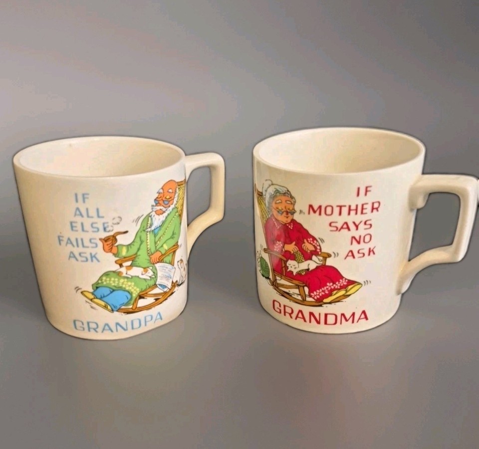 An '80s Japan ceramic mug duo that says 'Ask Grandma / Ask Grandpa' — a hilariously self-aware gift that doubles as a family announcement reveal prop.