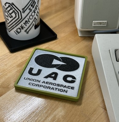 UAC Union Aerospace Corporation DOOM Drink Coaster Cork Bottom Blk/Slvr/Grn