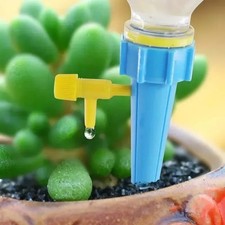 12X Garden Auto Water Bottle Drip Irrigation Device Self Watering Spikes Plant.