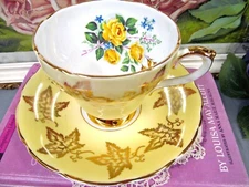 SUTHERLAND tea cup and saucer yellow & yellow roses pattern teacup gold gilt 