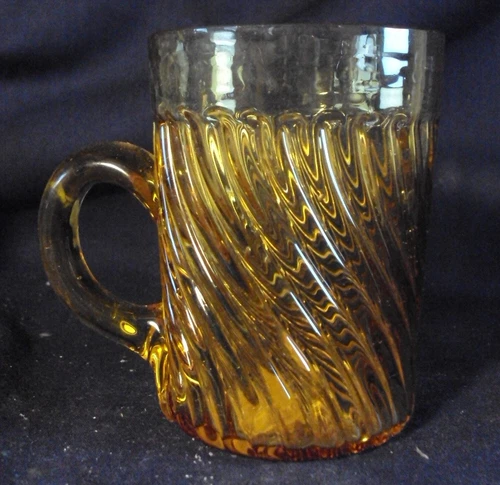 Amber glass mug cup blown applied handle swirl pattern