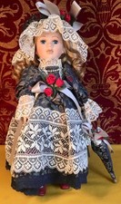 Beautiful porcelain doll - excellent condition - 1990's