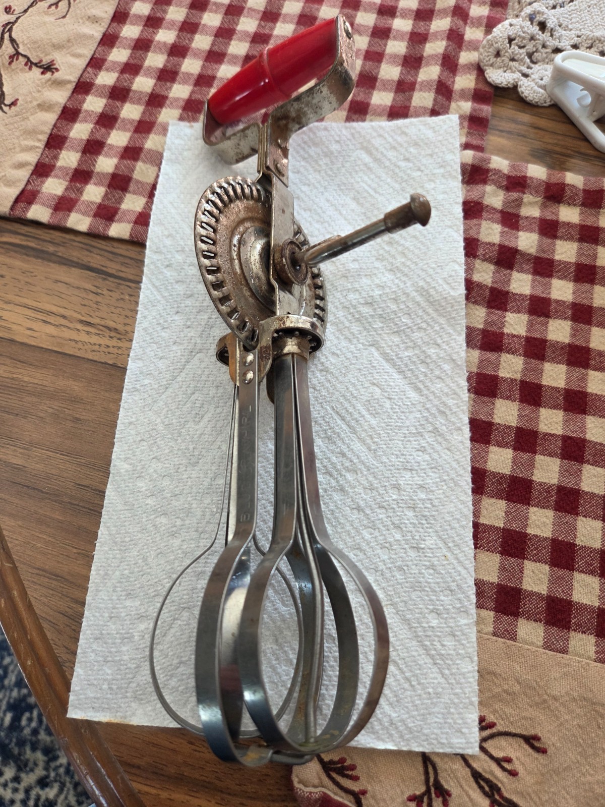 Vintage blue swirl stainless hand beater in good working condition