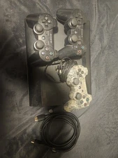 Sony PlayStation 3 Console with 3 Wireless DualShock Controllers