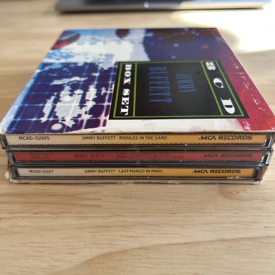 Jimmy Buffet 3 CD Box Set Riddles In The Sand, Last Mango In Paris Greatest Hits - Image 3 of 4