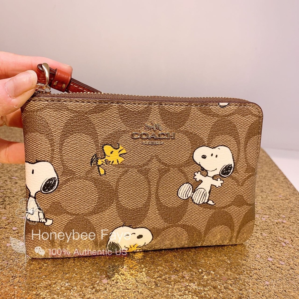 NWT Coach X Peanuts Corner Zip Wristlet In Signature Canvas NWT Coach X Peanuts Corner Zip Wristlet In Signature Canvas