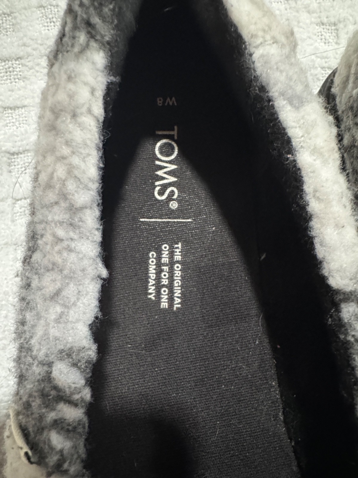 TOMS Fuzzy Black and Gray Checkered Platform Slip-Ons