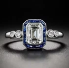 Art Deco 3.85Ct Emerald Cut Moissanite & Sapphire 14K White Gold FN Wedding Ring