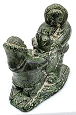 A Wolf Original Sculpture Hand Crafted Eskimos With Seal Pup Canada