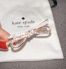 Kate Spade New York Bow Bangle - Rose Gold Tone. Elegant Kate Spade New York