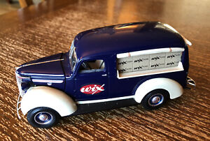 NIB 1939 Chevrolet Canopy Panel Truck Diecast Wix Oil Filters Bank First Gear  