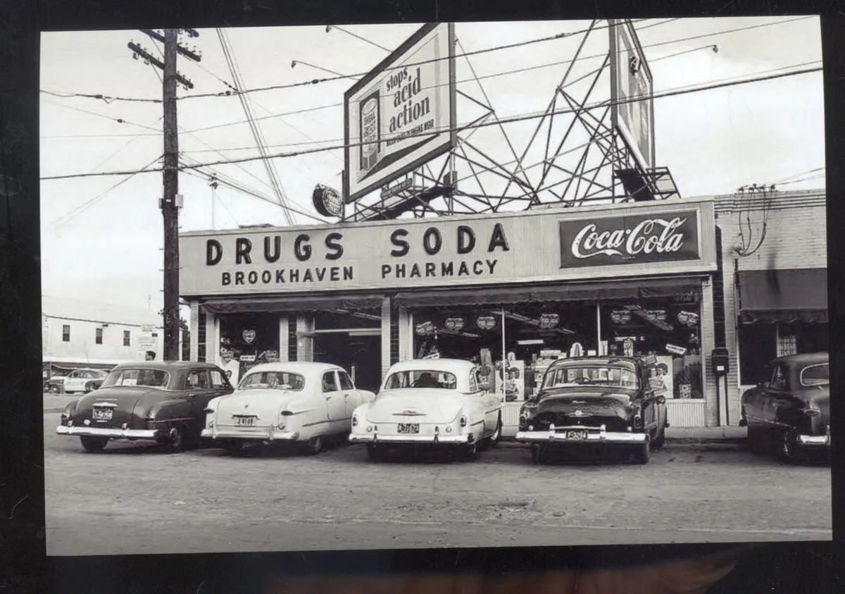 REAL PHOTO BROOKHAVEN MISSISSIPPI DRUG STORE ADVERTISING POSTCARD