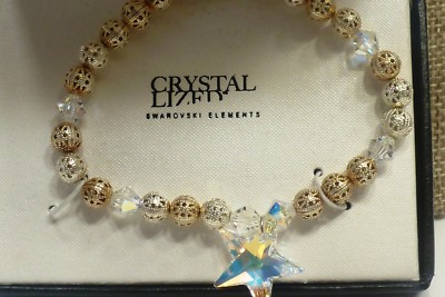 A36) Crystal Elements Gold and Silver-tone filigree beaded bracelet w/ star