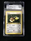 Eevee 55/82 Team Rocket - 1st Edition