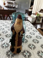 Primitive Painted Canvas Santa With 3D Basket Tree Boughs 7.5 Tall