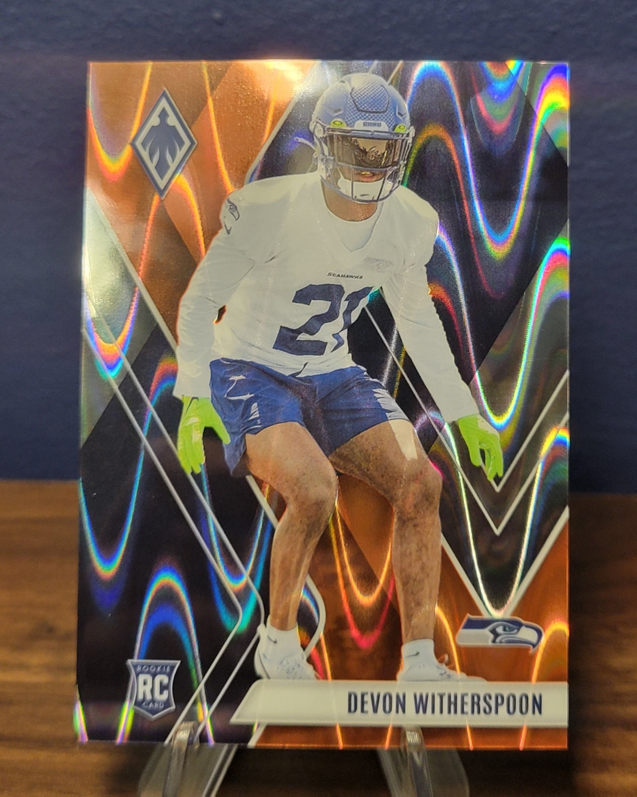 2023 Panini Phoenix - Rookies Devon Witherspoon #145 Orange /99 (RC)