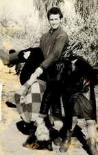 Vintage 1960s B&W Photo: Man Holding Woman Upside Down Snapshot Original Print