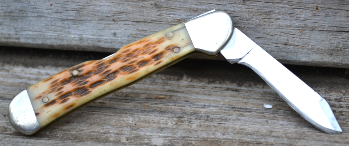 Vintage Case XX 61749L SS Mini Copperlock Jigged Amber Bone