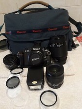 NIKON F-501 - 35mm - WITH 4 OPTICAL FLASH FILTERS AND BAG
