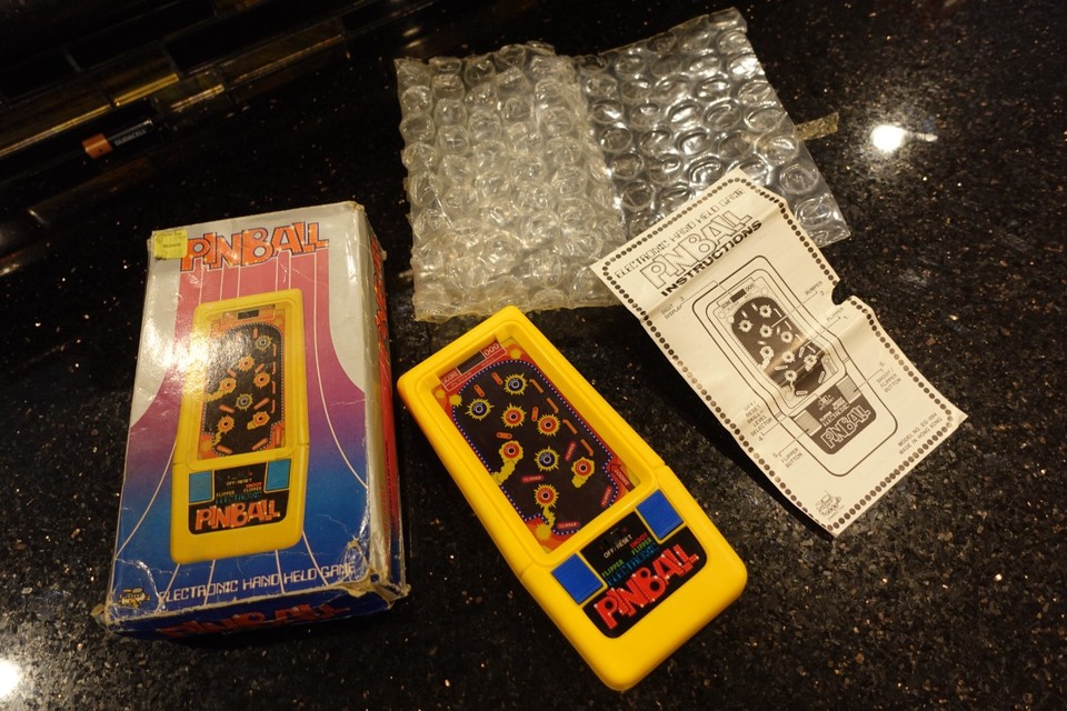 A boxed vintage Dynamic Pinball handheld from the late '70s — a genuinely rare pre-Game Boy electronic relic that looks incredible on a shelf.