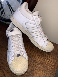 black and white high top shell toe adidas