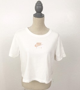 white and rose gold nike shirt