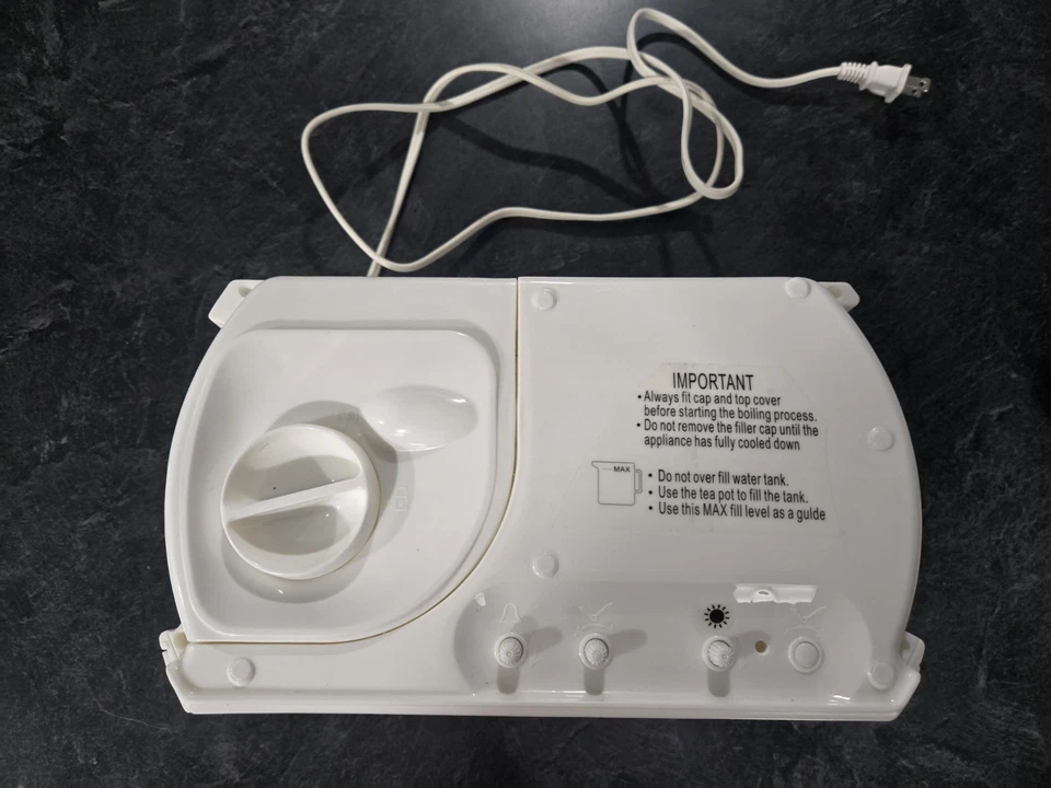 Vintage Swan Teasmade - Ebullición rápida con reloj y alarma Foto 4 de 4