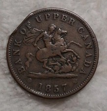 1857 Bank Of Upper Canada Half Penny Token. Mint Error- Straight Clip.