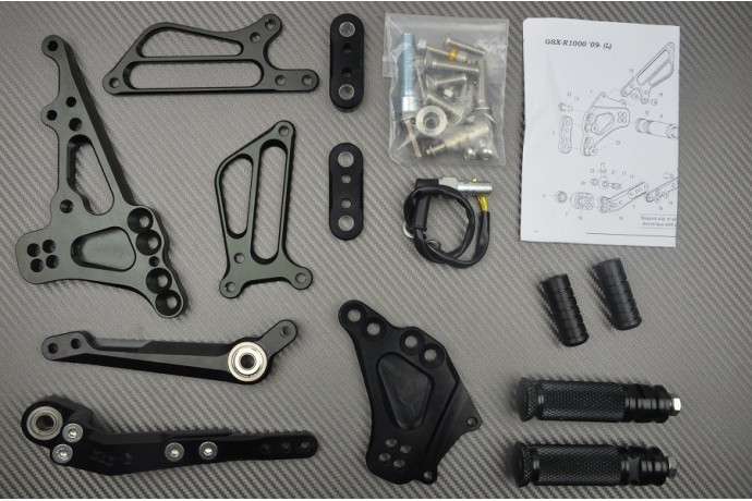 Commandes reculées moto GSXR 1000 réglables pour posture circuit sur Suzuki