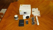 Imagen de Nikon 1 J1 10.1MP Digital Camera White (Kit w/ VR 10-30mm Lens) - Pristine