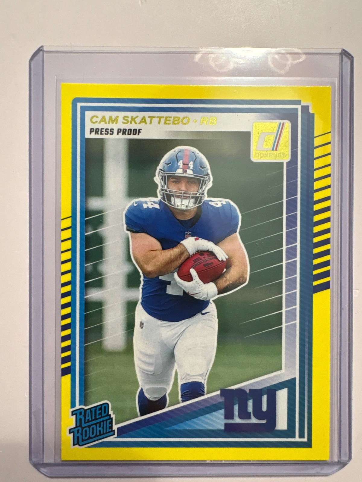 2025 Panini Donruss - Rated Rookie Cam Skattebo #302 Press Proof Yellow (RC)