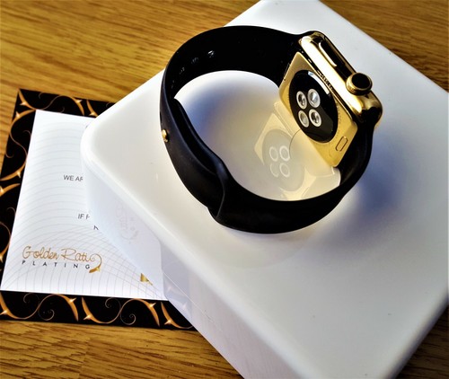 Apple Watch 24 carats édition or 42 mm acier inoxydable avec bracelet de sport noir 24 carats - Photo 3 sur 4