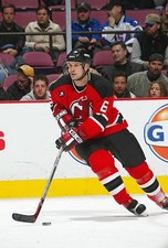 Dan McGillis New Jersey Devils controls the puck at a game v- Ice Hockey Photo