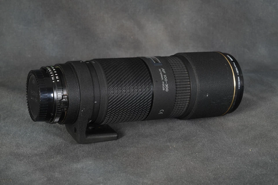Lente de enfoque interno Tokina AF AT-X 100-300 mm f/4 para Nikon AF Foto 2 de 4