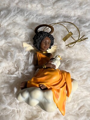 Ebony Vision~PEACE ON EARTH~ORNAMENT # 37054 BY THOMAS BLACKSHEAR 1ST EDI