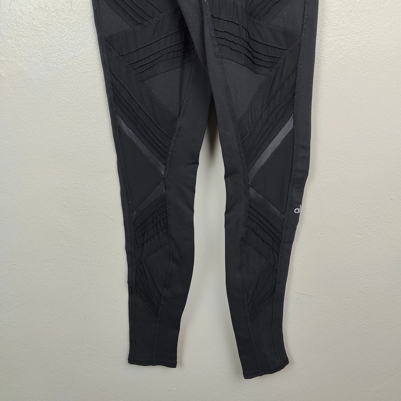 alo-yoga radiance eyelet patterned cut-out moto leggings