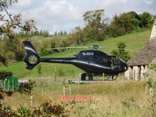 PHOTO  AIRBUS EUROCOPTER EC120 COLIBRI G-JSCB SITS ON THE HELIPAD AT KITESBRIDGE
