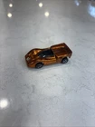 Hot Wheels 1968 McLaren M6A Redline Edition Metallic Orange