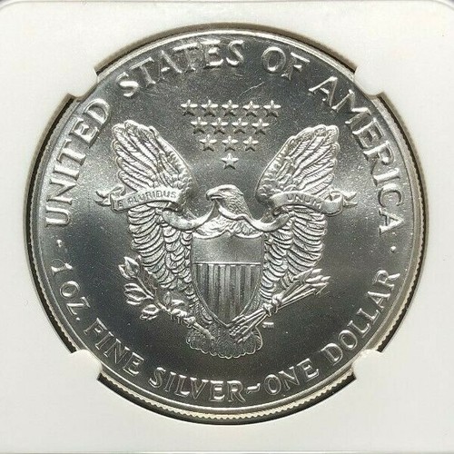1987 AMERICAN SILVER EAGLE ~ NGC MINT ERROR MS 69 OBVERSE STRUCK THRU - Picture 2 of 4