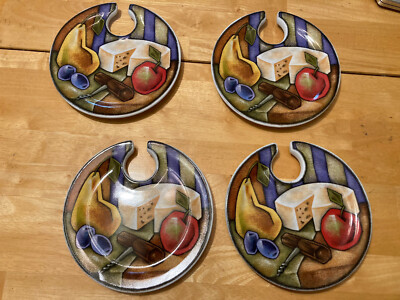 Four Small Dessert/appetizer plates shaped like artists  palette